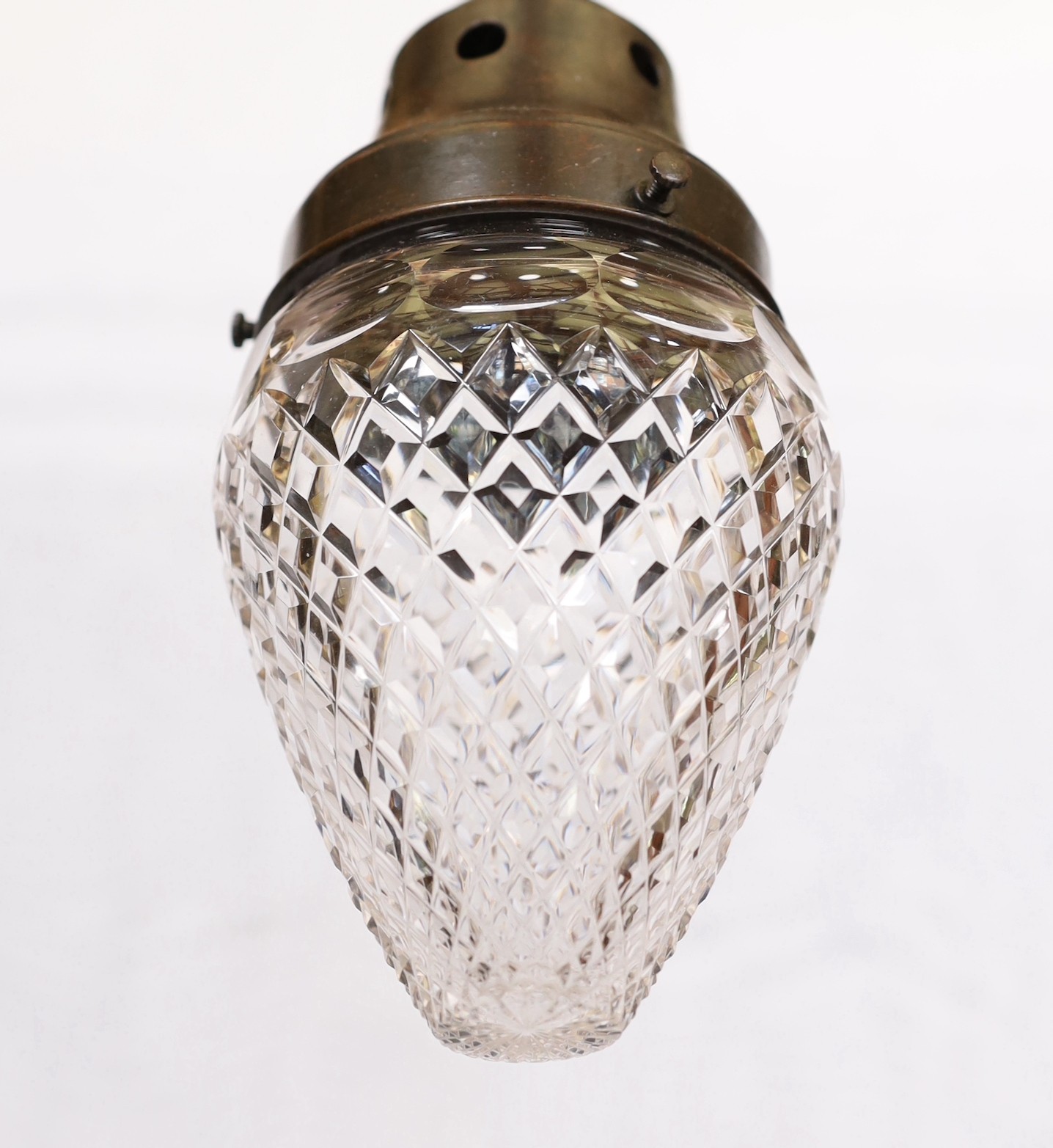 An Edwardian cut glass light pendant with bronzed mount, height 24 cm